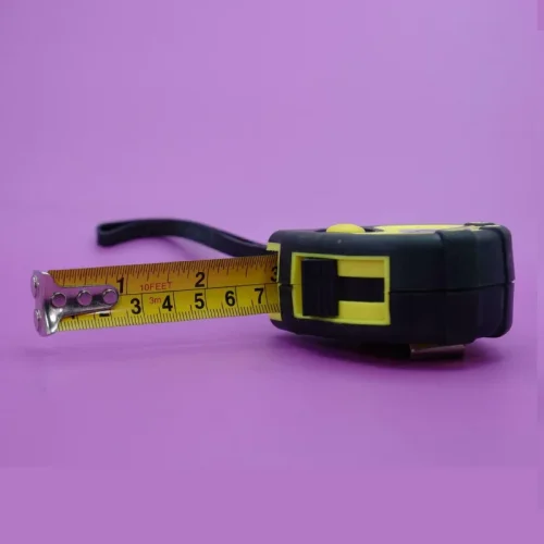 tape-measure-isolated-purple-background-measuring-tool-used-by-builders-free-photo